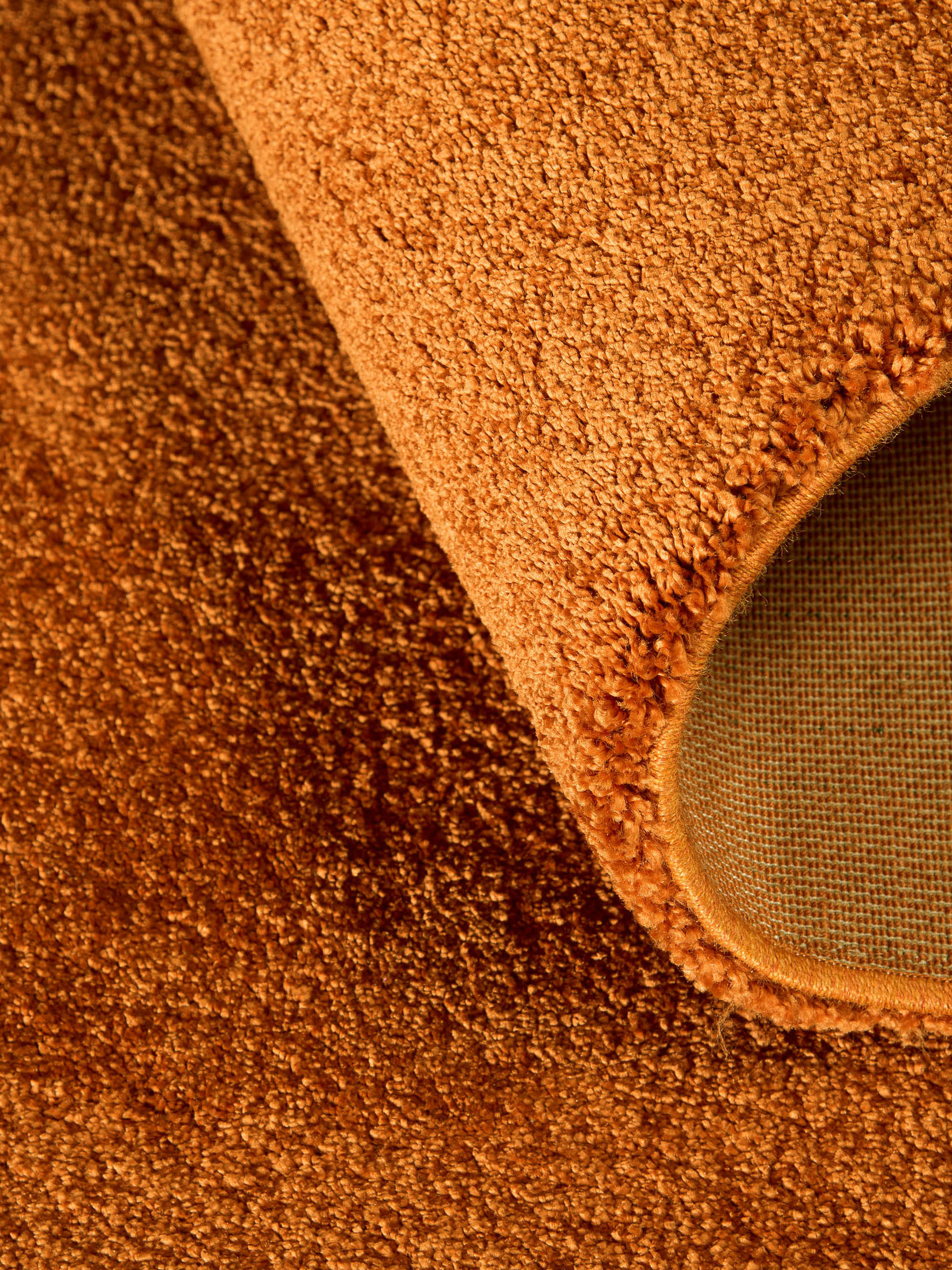 heritage-designer-teppich-von-kibek-in-orange
