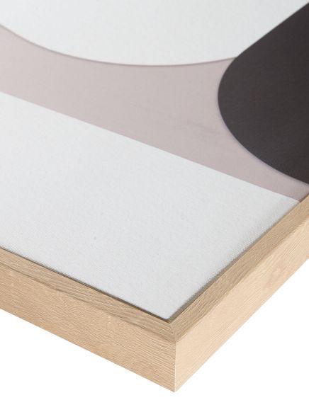 Eckrahmen eines Wandbilds mit geometrischem Muster in Beige, Weiß und Schwarz auf hellem Hintergrund.