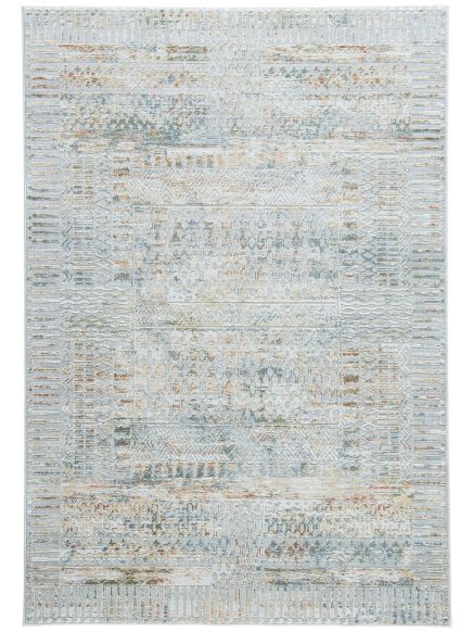 Teppich zeigt geometrische Muster in verschiedenen Blau-, Grau- und Beigetönen auf weißem Hintergrund.