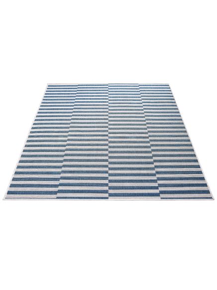 Teppich zeigt blau-graue Streifenmuster in regelmäßigen Reihen auf weißem Hintergrund.