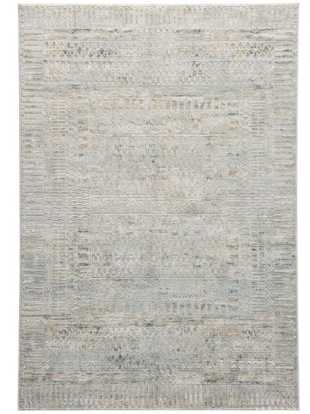 Teppich zeigt geometrische Muster in Beige, Grau und Blau auf hellem Untergrund, flach liegend.