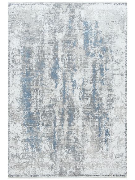 Teppich zeigt abstraktes Muster in Blau, Grau und Weiß, flach liegend auf neutralem Hintergrund.