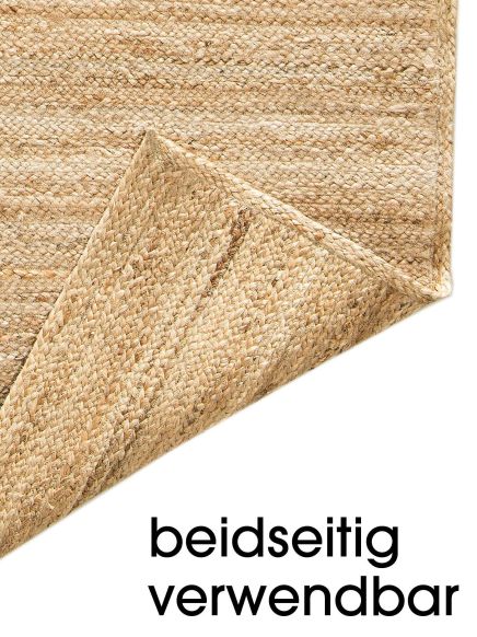 Juteteppich, Ecke hochgeklappt, zeigt Wendefähigkeit, auf weißem Hintergrund, Text: beidseitig verwendbar.