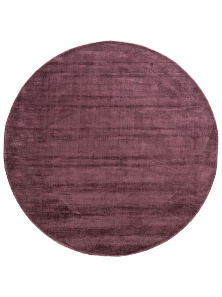Runder Teppich liegt flach auf weißem Hintergrund, violettfarben mit leichter Struktur.