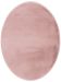 Runder Teppich liegt flach, rosa Farbe, auf weißem Hintergrund.